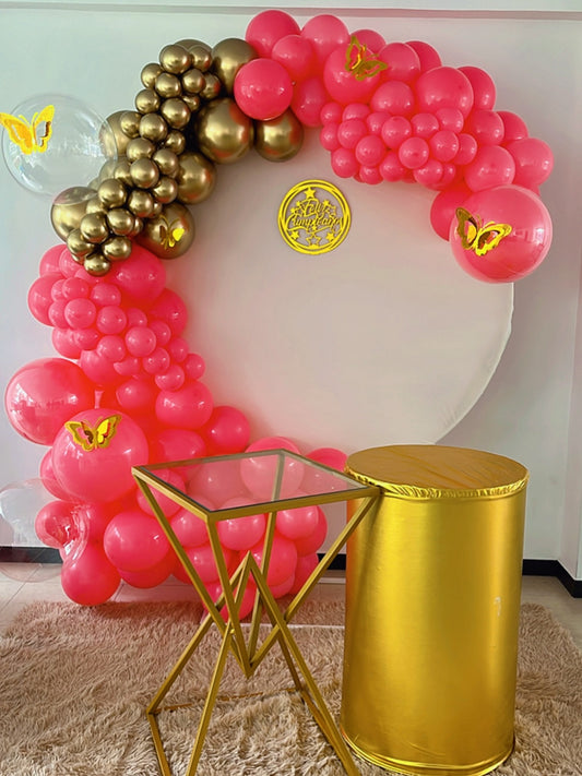 Arco circular de globos rosa y dorado
